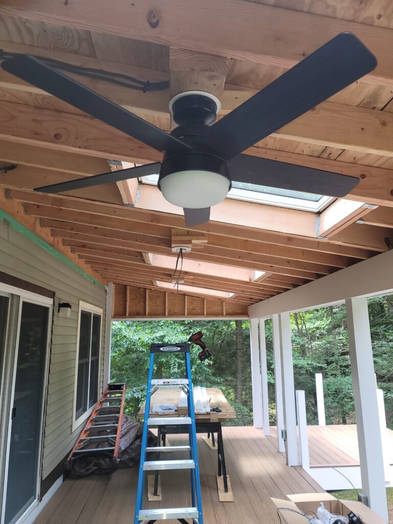 Professional outdoor ceiling fan installation by Prevolt Electric — safely mounted to solid wood framing with UL-rated electrical box and concealed wiring for a durable, balanced finish.