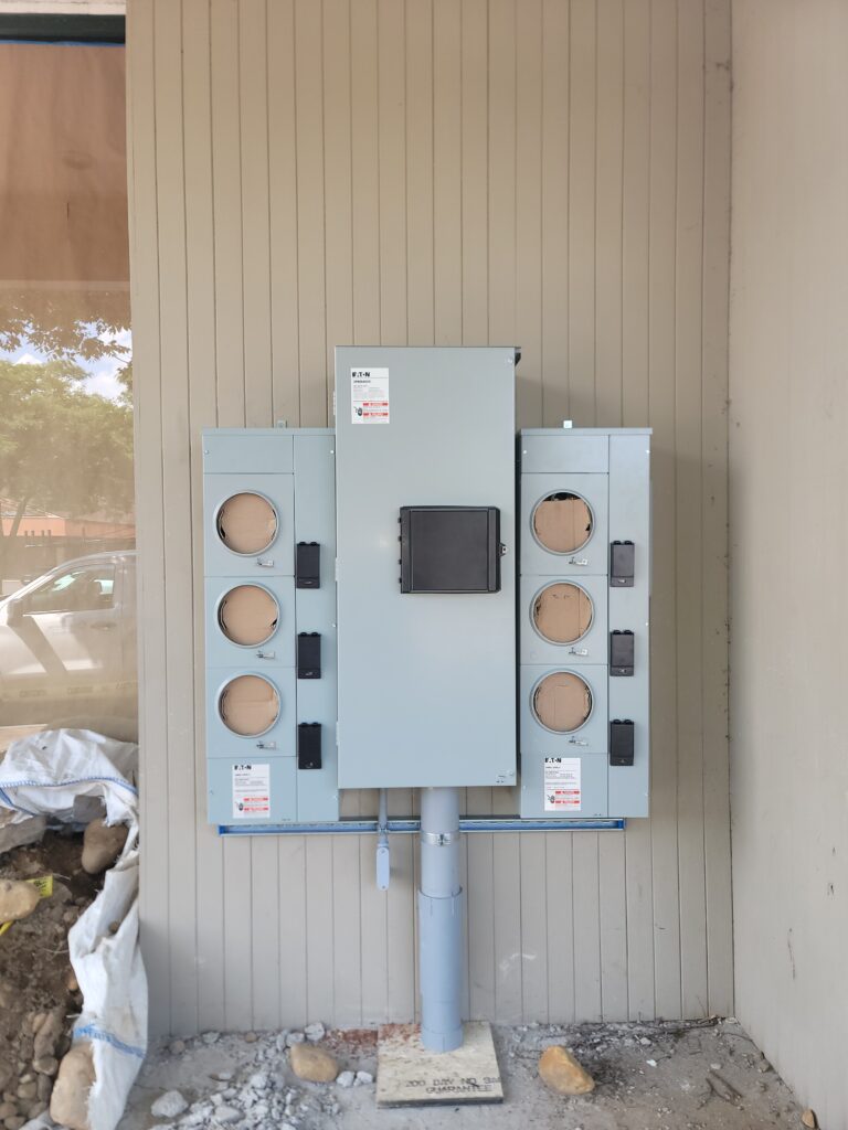 Newly installed commercial meter bank and underground electrical service equipment by licensed electricians at Prevolt Electric in Connecticut and Massachusetts.
